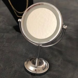 Double sided mirror with led light